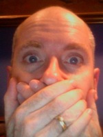 rob-quiet rob with his hands over his mouth